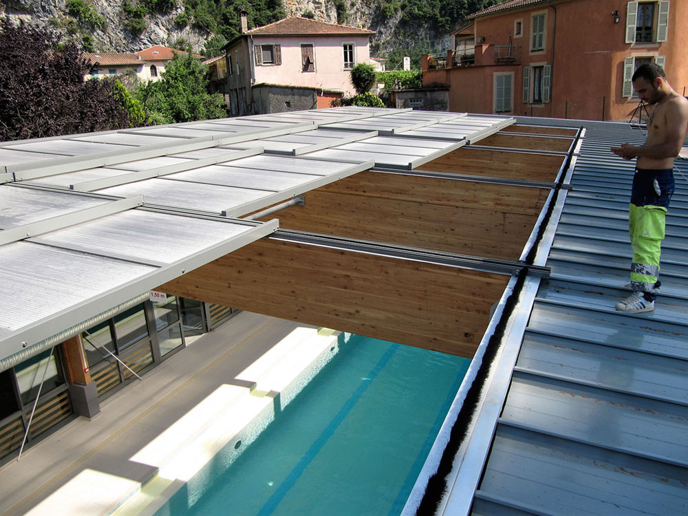 Grande surface couverte par une toiture ouvrante - TOITEL- piscine publique