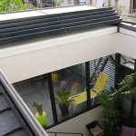 16006 Patio avec un toit coulissant