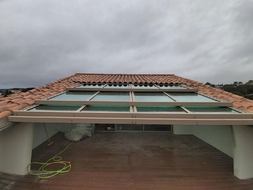 Terrasse avec un toit ouvrant - TOITEL