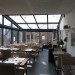 21009 Extension salle de restaurant par une véranda à verrière ouvrante
